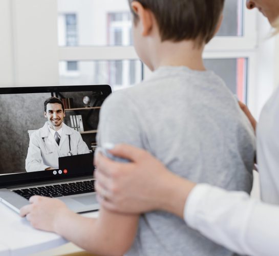 close-up-patient-talking-doctor-online